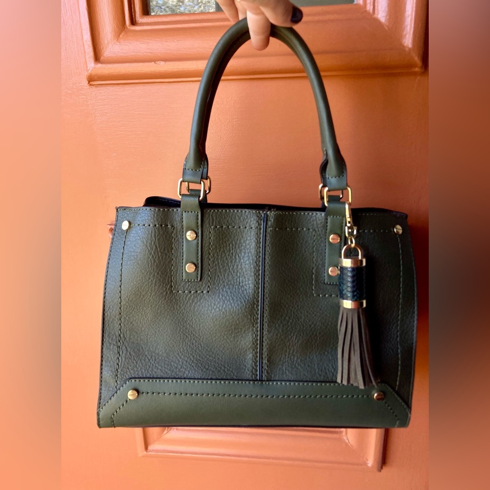 Green Aldo purse. With detachable cross body strap.